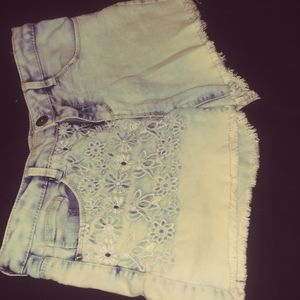 Size 14. Floral print on one side.